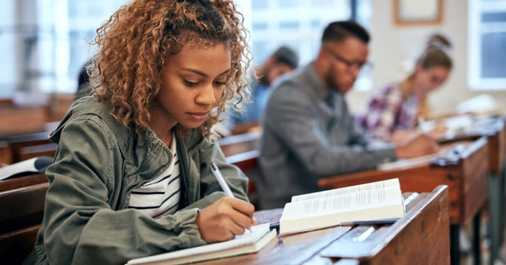 College students at desks in classroom